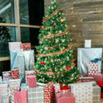 Christmas at Endeavor with Christmas Tree and presents in front loby