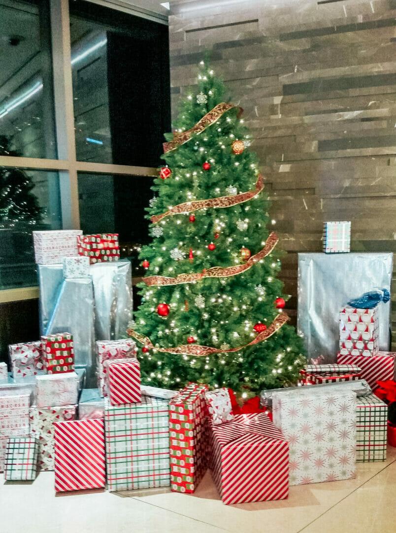 Christmas at Endeavor with Christmas Tree and presents in front loby