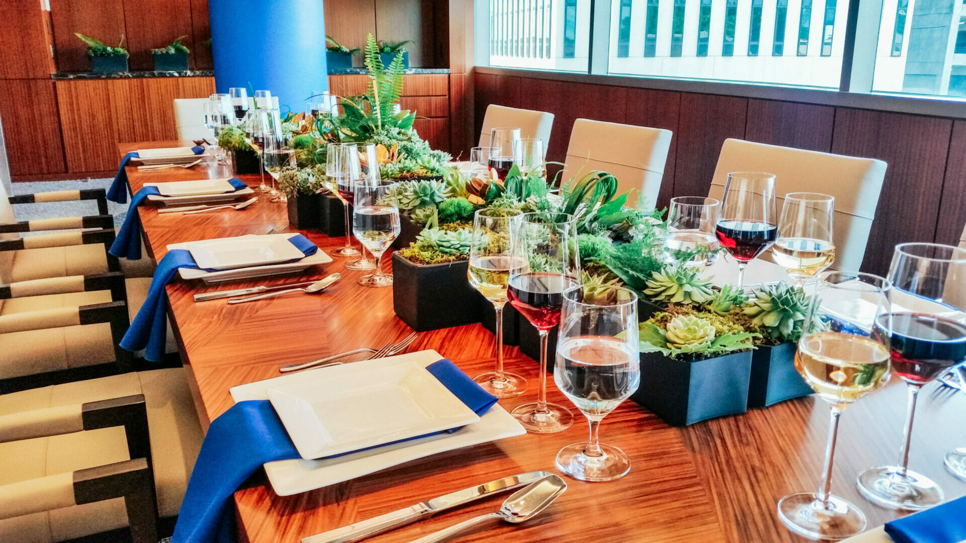 Holiday Dinner at Endeavor, table set with decor and wine glasses