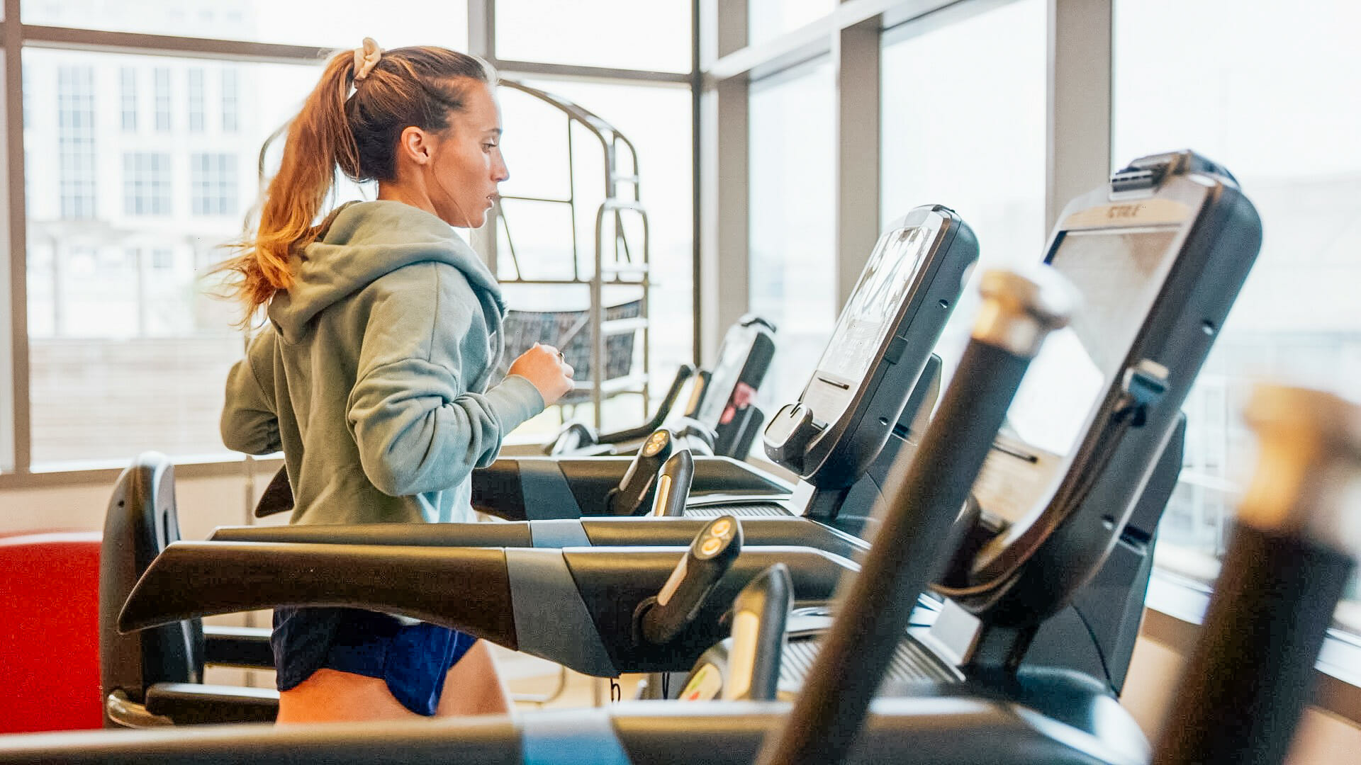 Member Running on Treadmill in Provided Gym